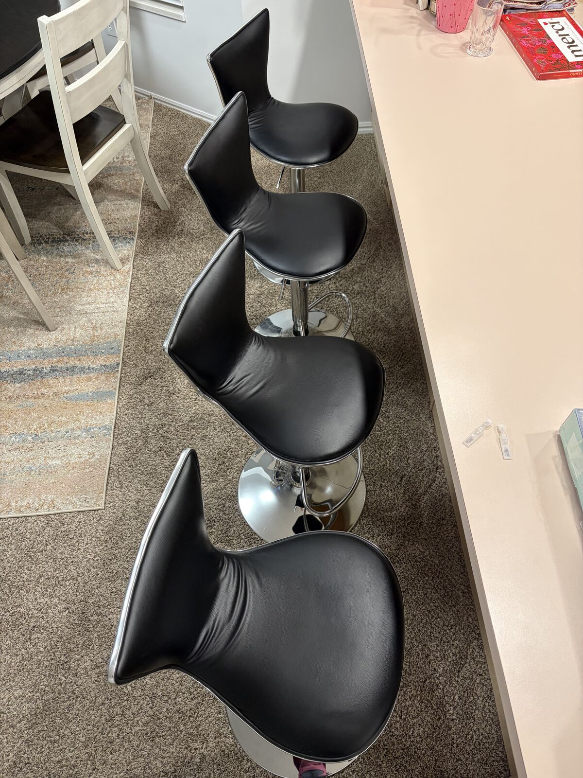 4 Black and Silver Barstools