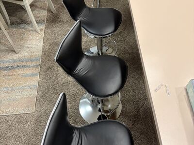 4 Black and Silver Barstools