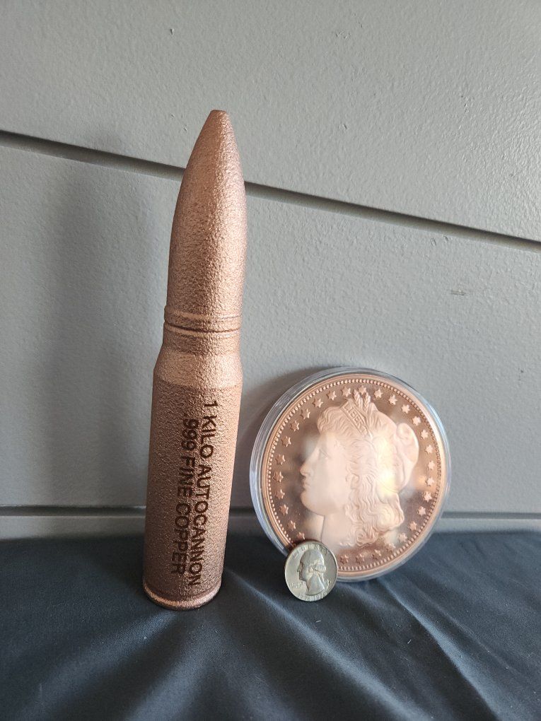 Copper! 1 kilo and 5oz Morgan round