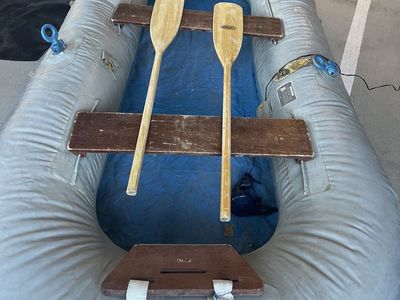 Vintage Inflatable Raft with Oars - Durable Classic Design for Water Adventures