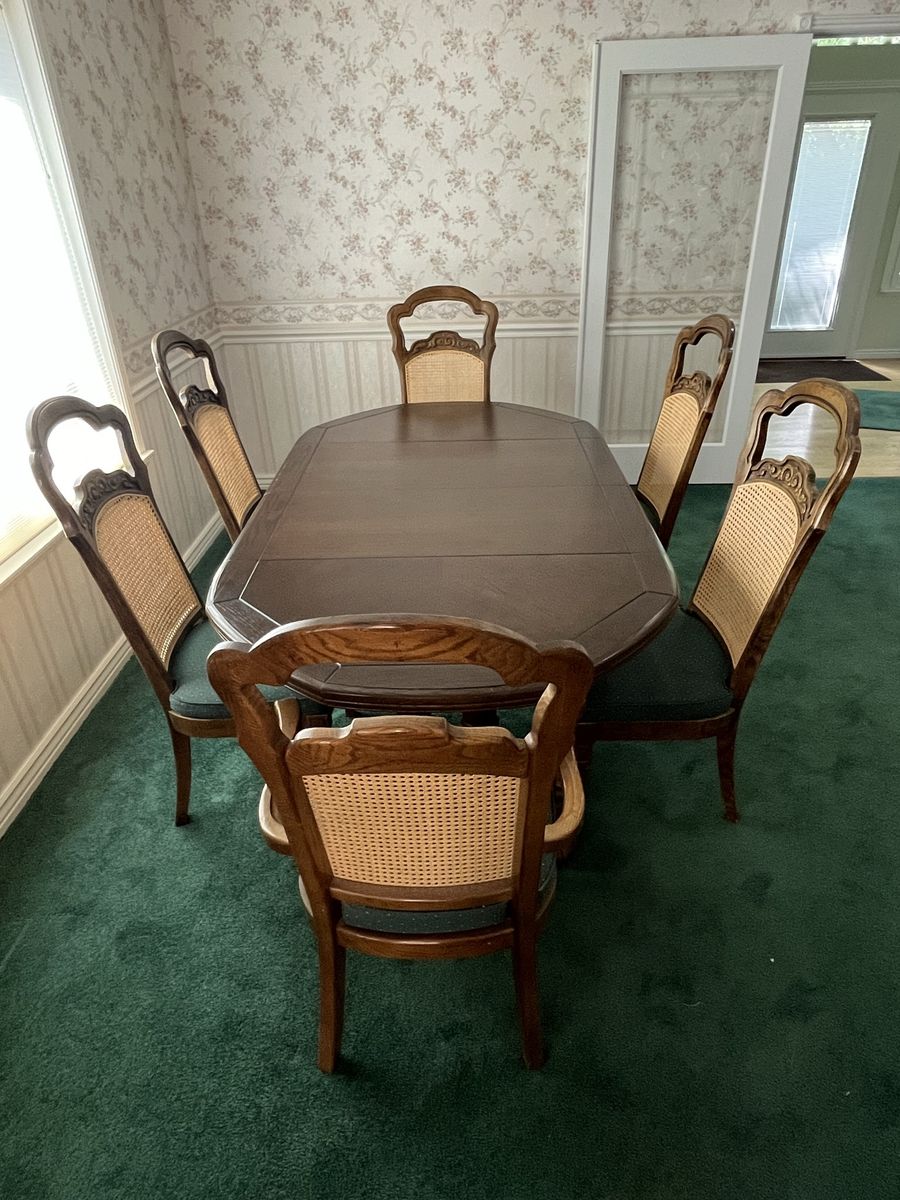 Gorgeous Vintage Solid Dark Wooden Dining Table Set with 6 Cane Back Chairs and Green Cushions OGDEN