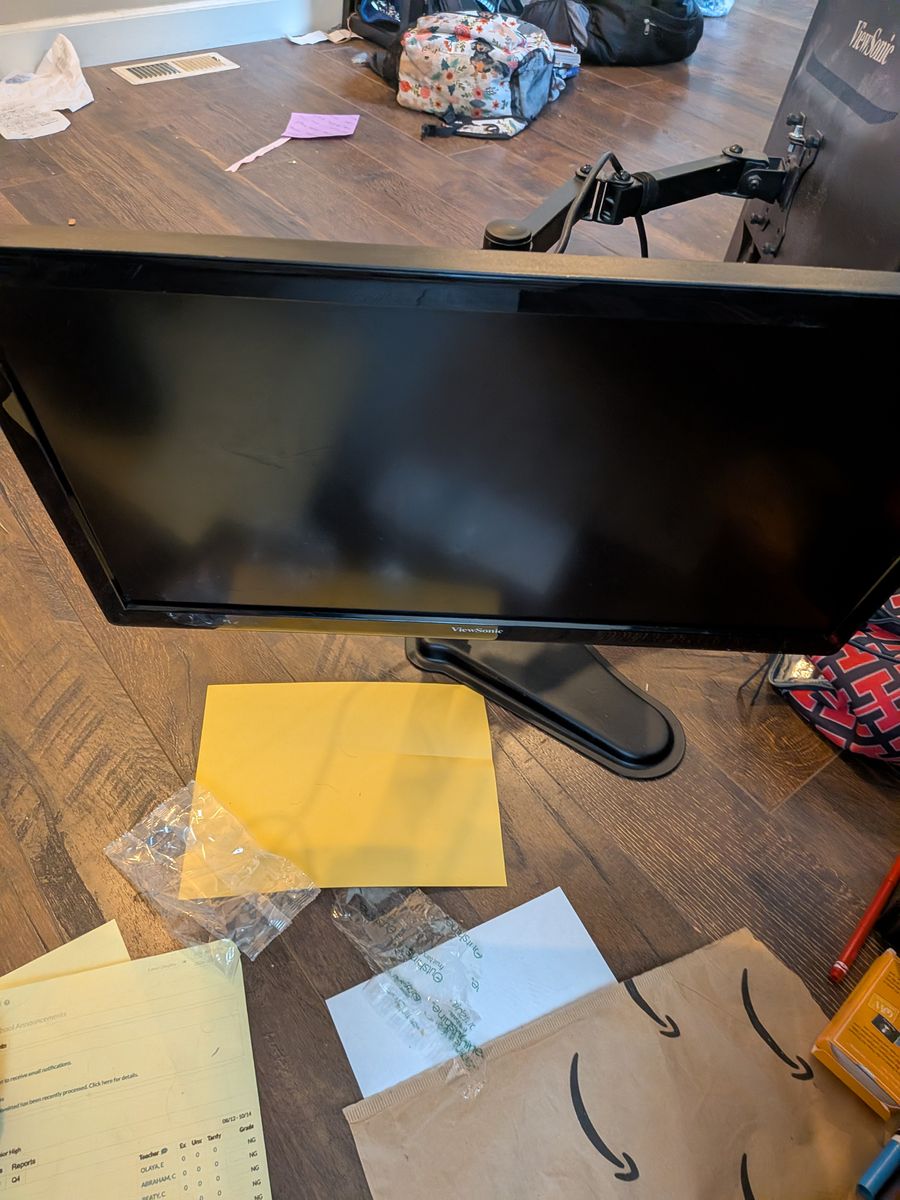 Duel monitors with metal stand and anker hub 