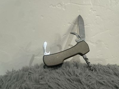 Unbreakable Survival Multi-Tool Pocket Knife with Corkscrew, Bottle Opener, Screwdriver