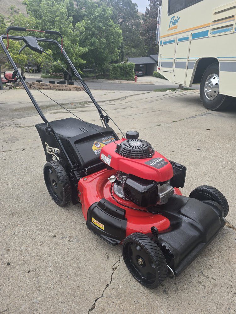Honda Blackmax self propelled lawn mower
