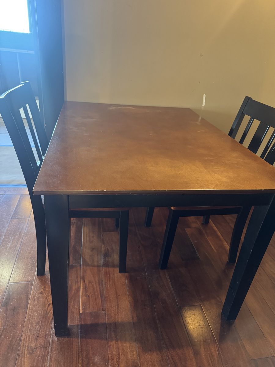 Wooden Dining Table Set with Black Legs and Chairs Used