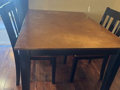 Wooden Dining Table Set with Black Legs and Chairs Used
