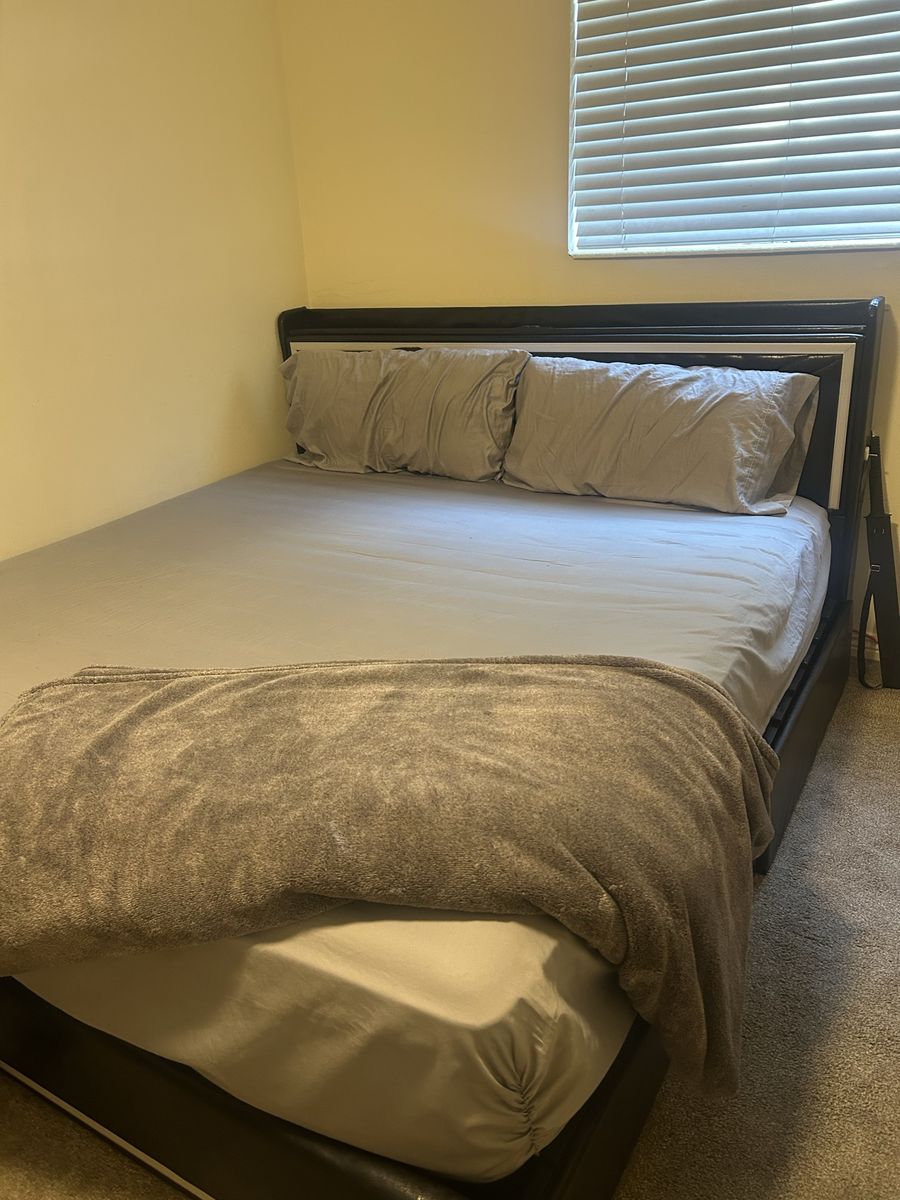 Black Wooden Bed Frame with Sleigh Headboard