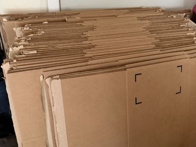 Large Stack of Flat Cardboard Boxes / Packing Material