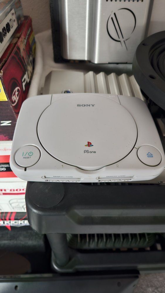 PSone with Controller and a Couple Games (All cords)