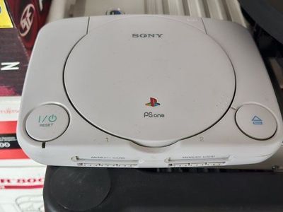 PSone with Controller and a Couple Games (All cords)