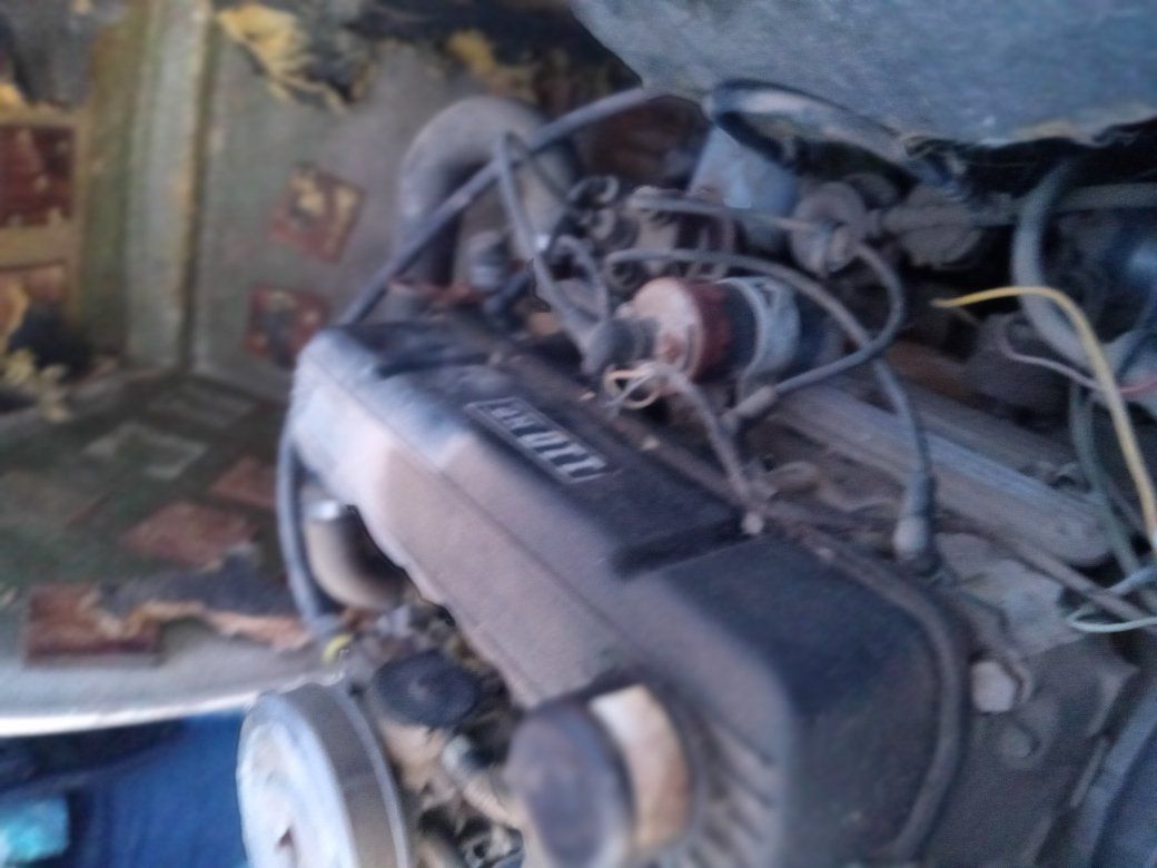 Old Boat with a four cyl Chev motor .