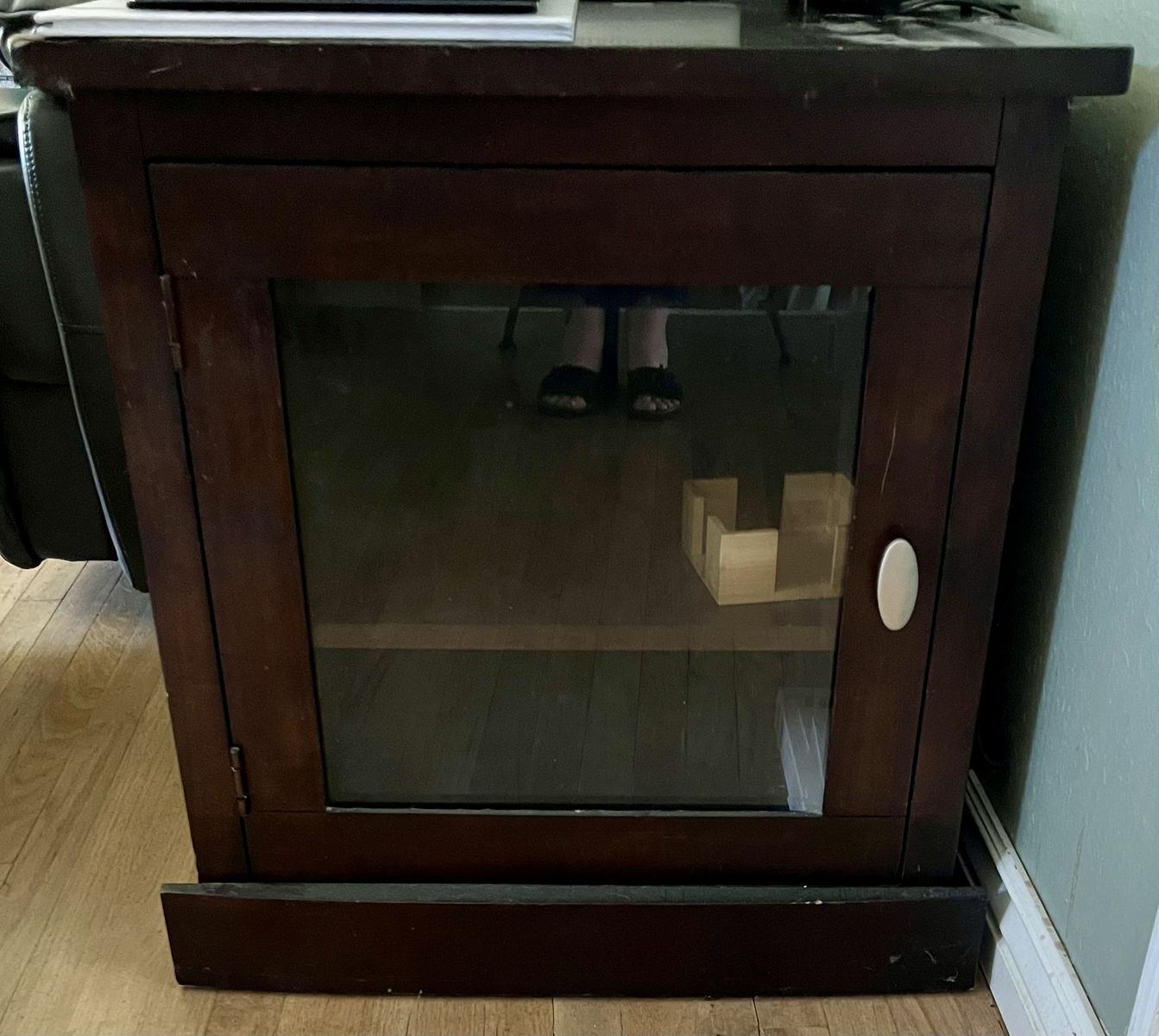 Table with storage glass door