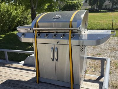 Large gas grill with side burner