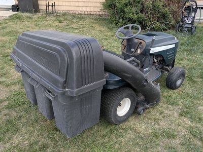 Craftsman Riding Mower with grass catcher and plow
