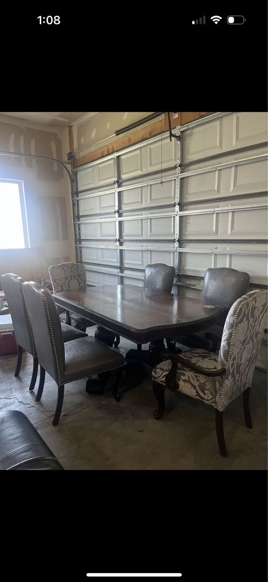 Dining Table with Chairs and Metal Shelving Units