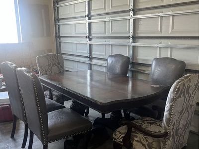 Dining Table with Chairs and Metal Shelving Units