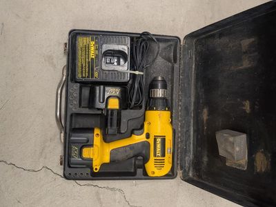 DeWalt drill + charger with 2 batteries in metal case $50.00