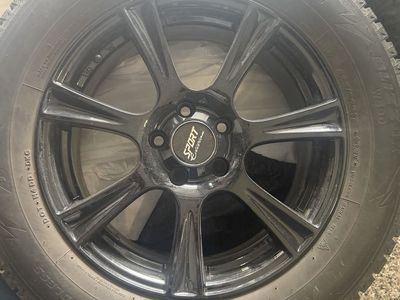 Bridgestone Blizzak WS90 235/60R17 Winter Tire on Sport Edition Black Wheel set of 4