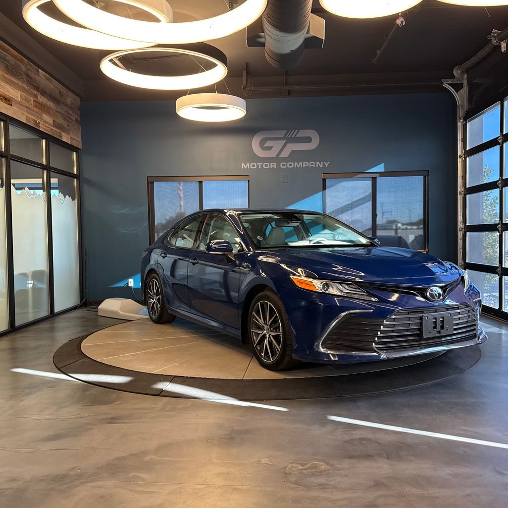 2023 Toyota Camry XLE — rebuilt & branded title, 22% below market