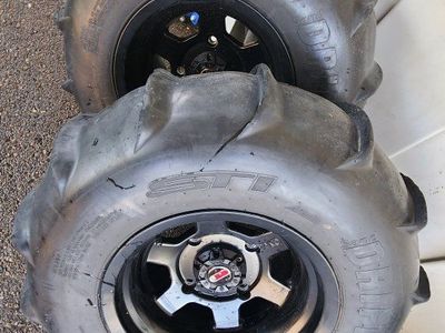 14" GSM wheels / STI Sand Drifter 28"x13"x14" (rear 14 paddle) 28"x10"x14 (fronts)
bolt pattern 4-156