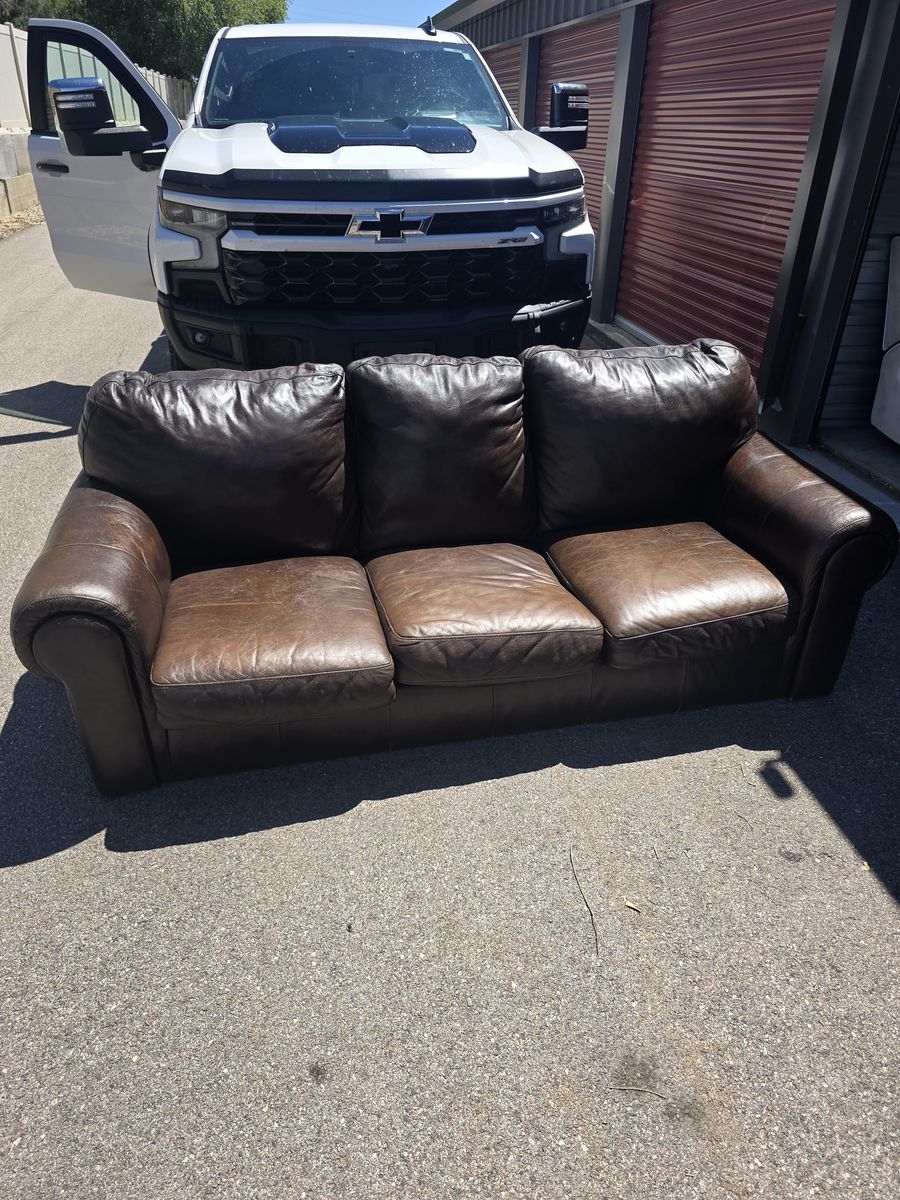Heavy brown leather couch