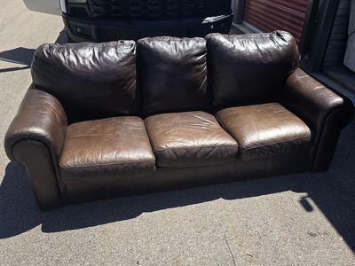 Heavy brown leather couch