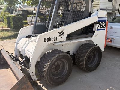Bobcat 763 Skid Steer Loader - White/Orange, Diesel Engine, Heavy Equipment