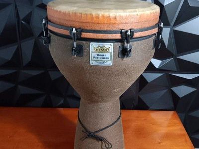 Remo Mondo Key Tuned Djembe 14" Diameter, 25" Height in Fabric Earth. Excellent Conditions! Carring Case included.