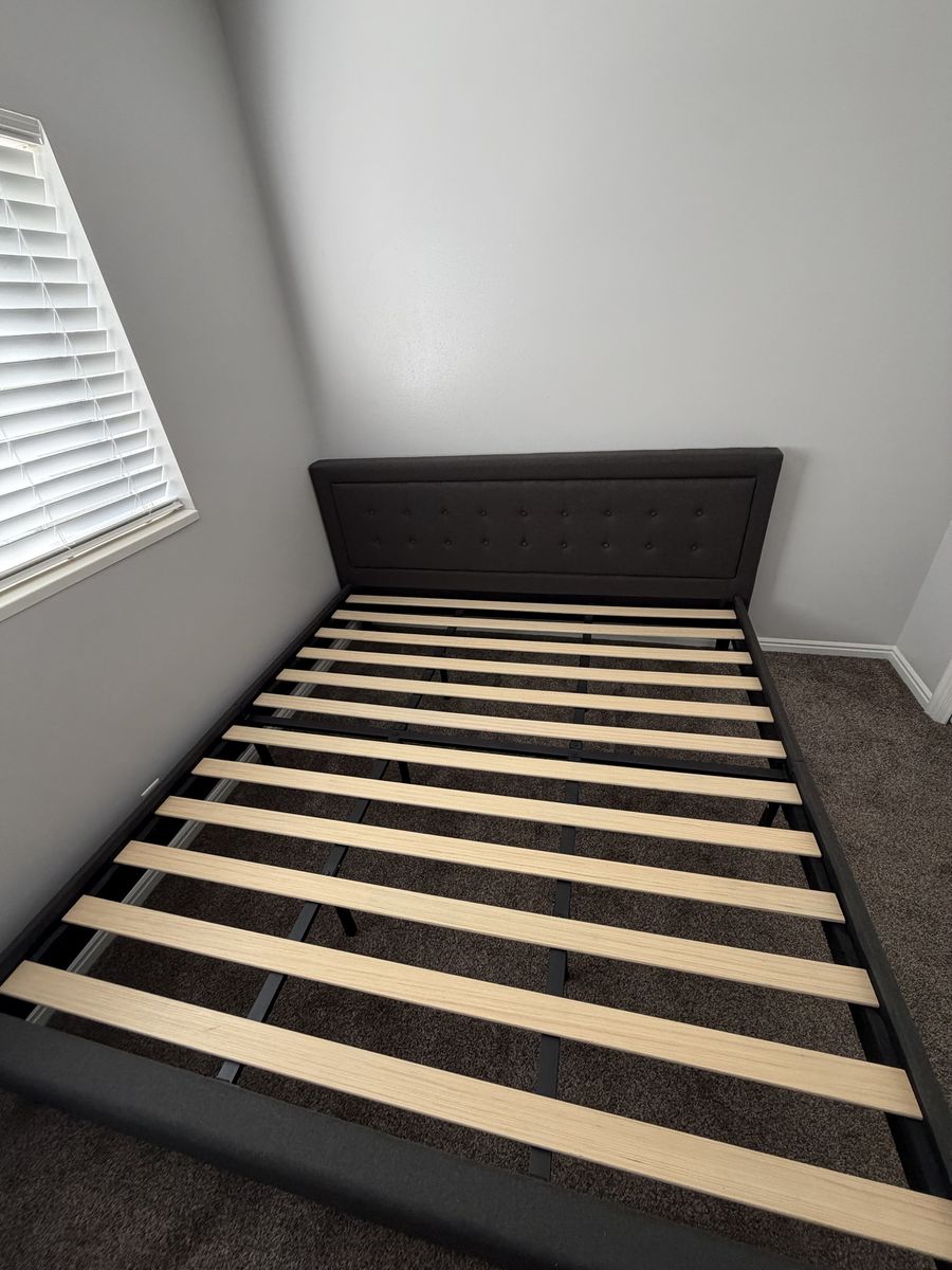King - sized bed frame and headboard
