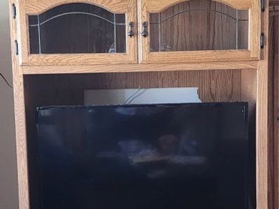 Sturdy wood entertainment center