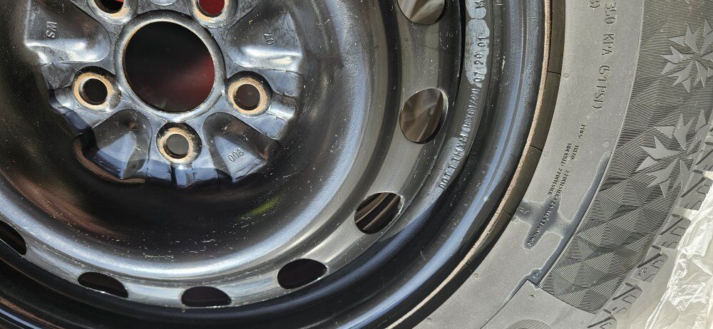 Winter tires 225/65 R16 on rims w/caps