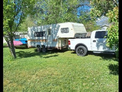 84 nomad 5th wheel camp trailer 20ft. make offer