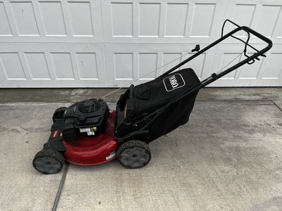 Clean and almost new - Toro self-propelled 21 inch gas lawn mower