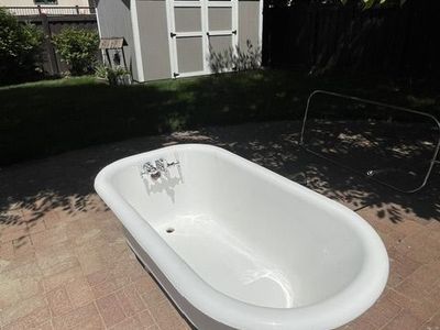 4'8" Vintage Cast Iron Chrome Claw tub with faucet, shower/curtain rod and drain hardware