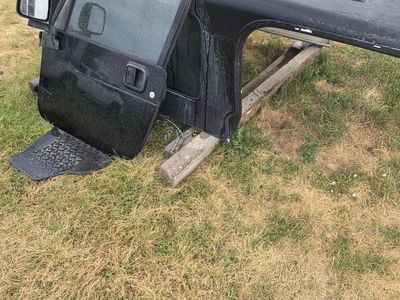 l j hard top and a set
factory doors. top