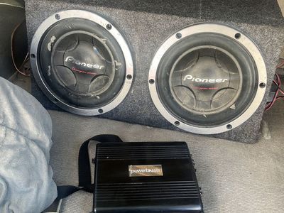 Two 10 inch pioneer champion series and amp