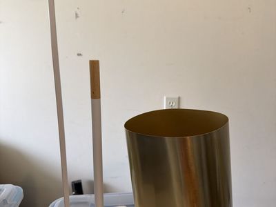 Target Toilet paper holder stand and gold trashcan