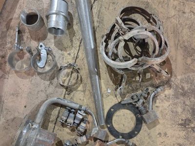 Assorted Industrial Equipment Parts: Filters, Clamps, Fittings