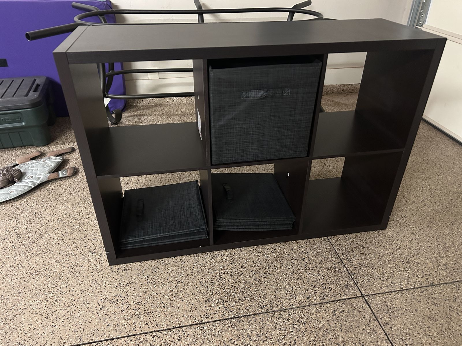 Black Storage Unit With Grey Bins