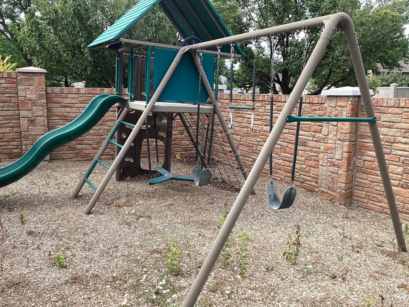 Lifetime Sturdy Children's Outdoor Playset with Slide, Swings, and Climbing Features