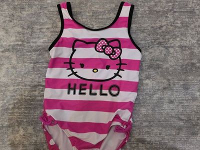 Girls Hello Kitty Pink Striped and Polka Dot One-Piece Swimsuit
Size 7-8
Smoke Free Home
