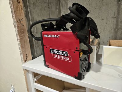 Lincoln Portable Welder. NEW, still in the original box