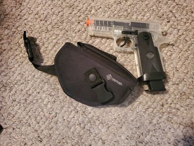 Airsoft handgun with holster