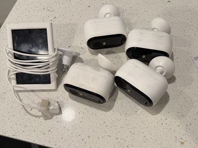 Arlo cameras solar power charger and 4 cameras