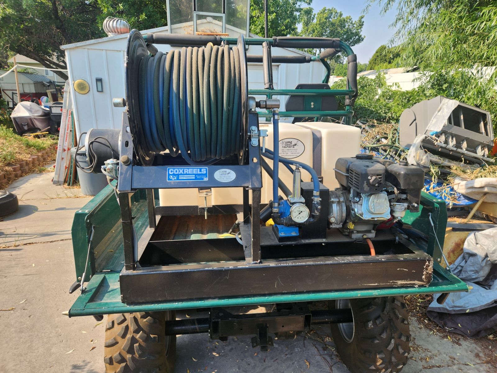 Sprayer unit with hose, motor and rack for ATV, pick-up or trailer
