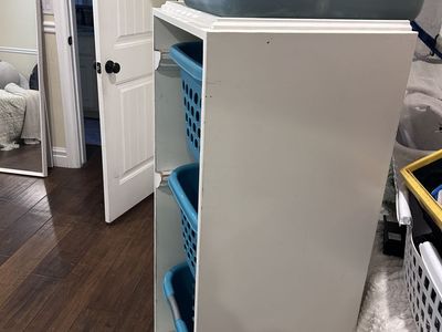 Laundry Sorter Cabinet Custom one of a kind. Baskets included.