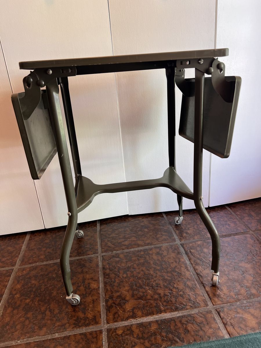 Really cool Vintage typewriter table on wheels.