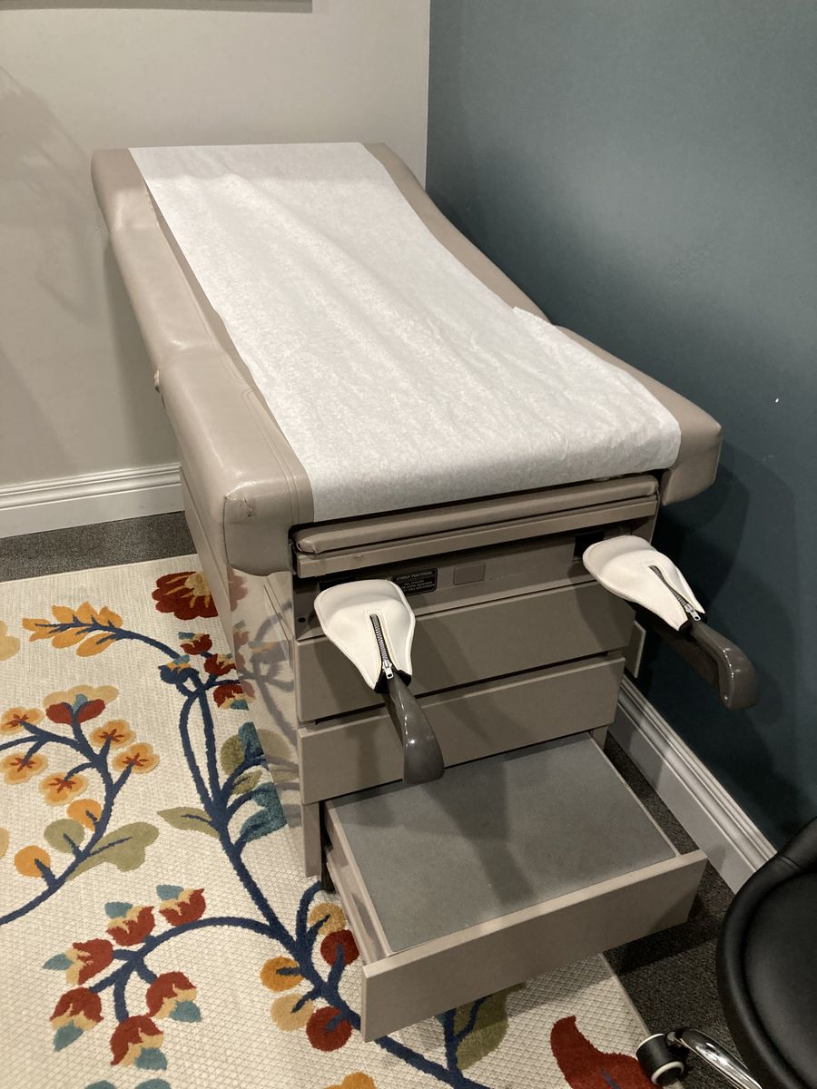 Medical exam table