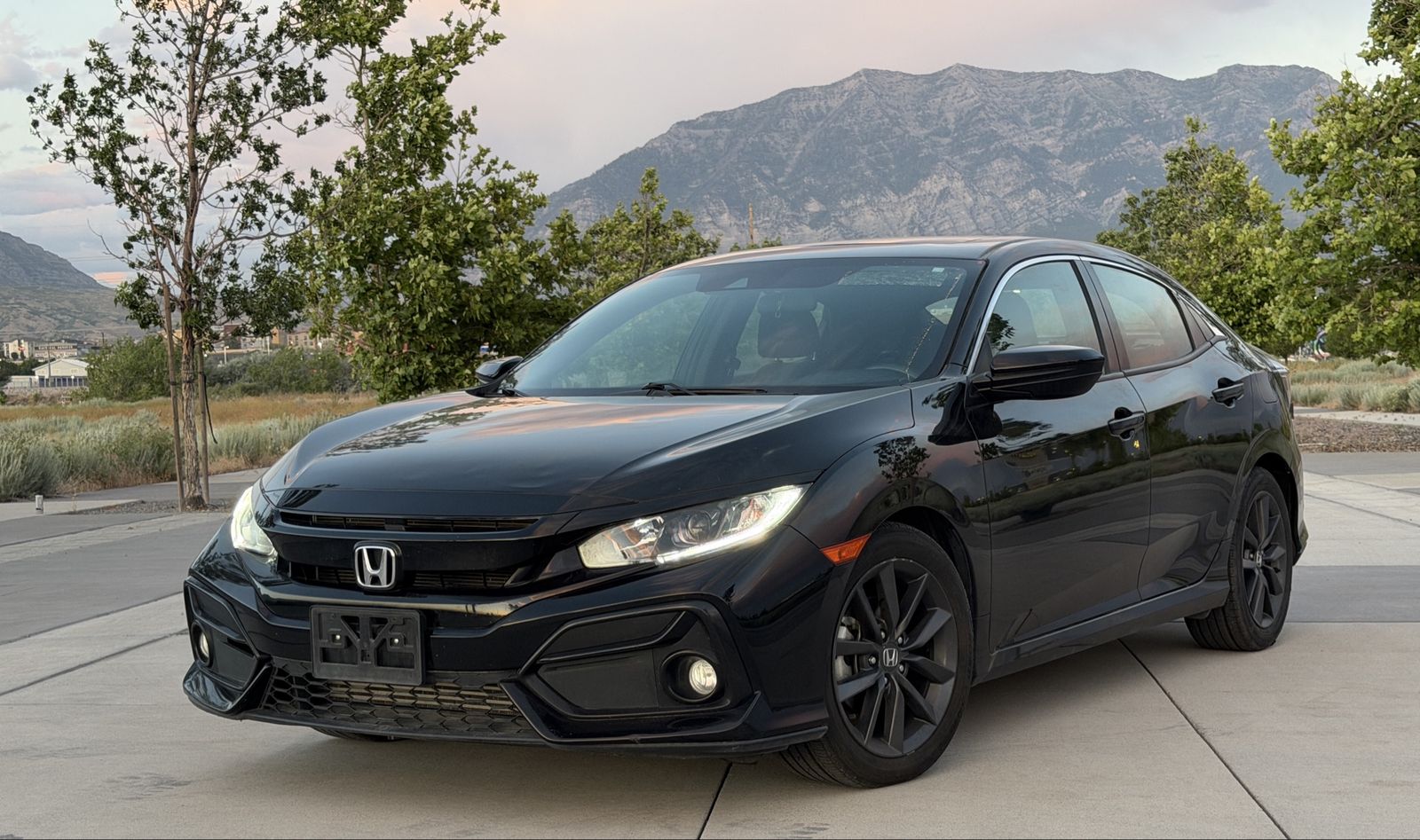 2020 Honda Civic EX — rebuilt & branded title, 26% below market