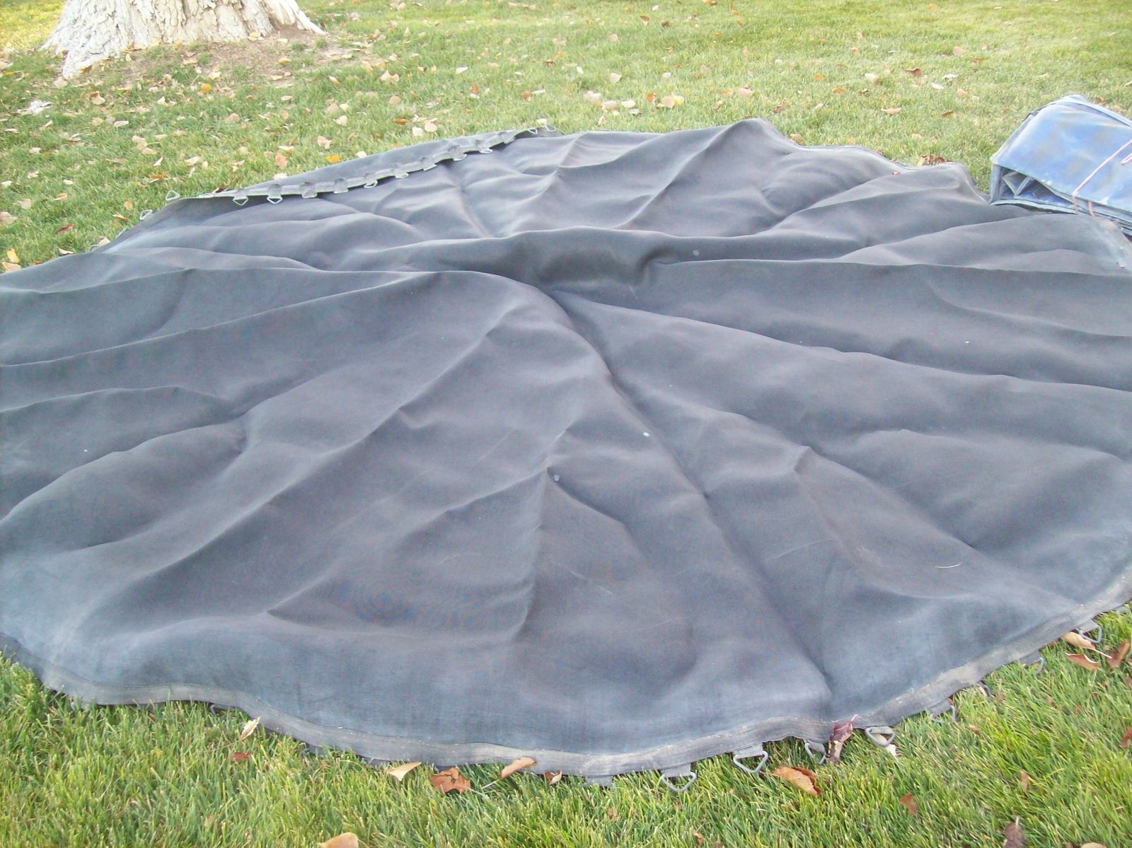 Used trampoline mat with springs and pads for sale. $120 CASH ONLY..